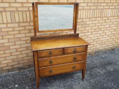 A vanity chest of two over two drawers m