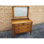 A vanity chest of two over two drawers m