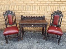 Two chairs with carved decoration and le