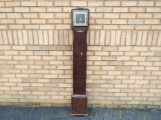 An oak cased Enfield granddaughter clock