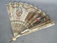 A decorative hand fan, size 22 cm