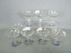 Eight vintage Babycham advertising glass