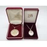 Silver Jewellery - Two silver locket pendants with engraved decoration on silver chains,