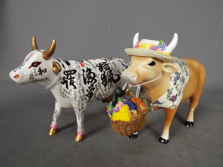 Four 'Cow Parade' figures, one contained in original box, largest approximately 15 cm (h). - Image 4 of 4