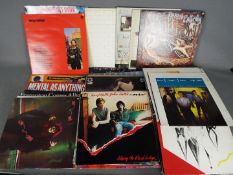 Approximately sixty 12" vinyl records comprising Jefferson Starship, Grace Slick, The Jam,