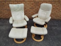 Two Ekornes Stressless lounge chairs and matching footstools.