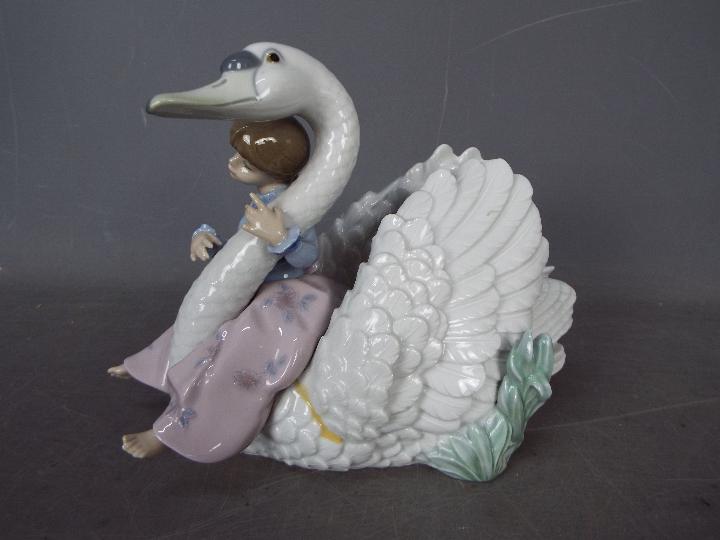 Lladro - A boxed figural group entitled Swan Song, # 5704, approximately 18 cm (h). - Image 4 of 6