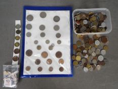 Numismatology - a collection of predominantly foreign coinage from bygone times with some UK