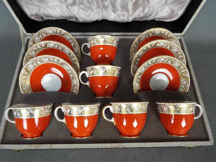 An early 20th century cased Minton porcelain set of 6 cups and saucers, - Image 3 of 5