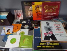A collection of vinyl records, predominantly world music, classical, musicals and similar.