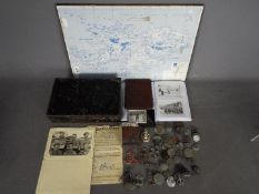 Lot to include photographs, military badges, map of the Falklands first aid tin,