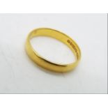 A 22ct gold wedding band, size P, approximately 3.4 grams all in.