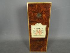Justerini & Brooks - A 75cl bottle of J&B Reserve 15 Years Old, 43% ABV, level upper shoulder,