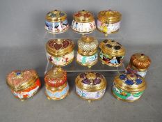 A set of eleven Franklin Mint House Of Faberge musical trinket boxes.