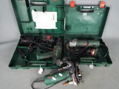 Lot to include a Bosch POF 500A plunge router,