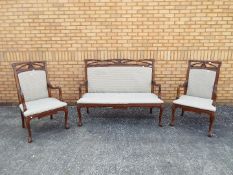 A good clean upholstered mahogany three-piece suite, the sofa 114 cm (h) x 145 cm (w) x 61 cm (d),