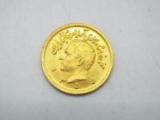 Gold Coin - A Persian one Pahlavi coin, approximately 8.2 grams all in.