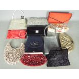 A quantity of lady's evening bags, some still with tags, appear mostly unused.