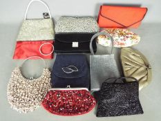 A quantity of lady's evening bags, some still with tags, appear mostly unused.