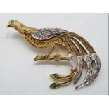 A 9ct gold stone set brooch in the form of a peacock, approximately 4.2 grams all in.