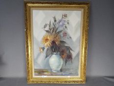 A framed oil on canvas still life, signed lower right by the artist, approximately 69 cm x 48 cm.