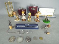 A mixed lot of collectables to include a Parker pen set, hip flasks, hourglass, coins and similar.