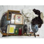 A mixed lot to include vintage linen, plated ware, pictures, coins, walking sticks,