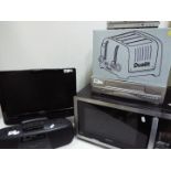 Lot to include a microwave, boxed toaster, video recorder, DVD player and similar.