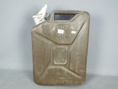 Jerry can - a UK force used 20 litre "jerry can" in desert camo.