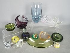 A collection of glassware comprising paperweights, vases and similar by Caithness, Mdina and others.