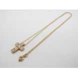 A 14ct gold chain and diamond set cross pendant, 44 cm chain, approximately 2.5 grams all in.