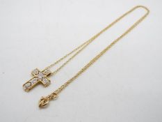 A 14ct gold chain and diamond set cross pendant, 44 cm chain, approximately 2.5 grams all in.