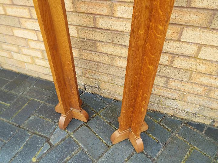 A pair of Gothic revival light oak Arts and Crafts style Torcheres, approx 121. - Image 3 of 5