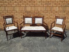 A 19th century upholstered mahogany three-piece suite, the sofa 94 cm (h) x 103 cm (w) x 52 cm (d),