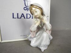 Lladro - A boxed figurine entitled Little Virgin, # 5752,