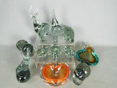 Lot to include nine Ngwenya Glass animal form paperweights and two art glass bowls.