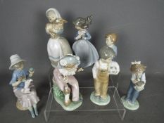 Nao - Seven figurines by Nao, predominantly of children, largest approximately 21 cm (h).