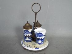 Staffordshire Pottery - a Blue and White ceramic cruet set,