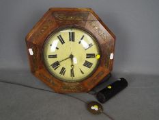 Postman's Clock with Wooden Dial. Early example with weight and pendulum.