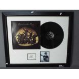 The Beatles - Framed autograph montage comprising a photograph,