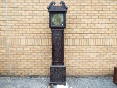 A late 18th century 30-hour longcase, the case with long door and quarter reeded columns,