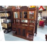 A late 19th / early 20th century large carved mahogany buffet sideboard,