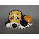 Lorna Bailey - a figurine of a dog entitled Dozy,