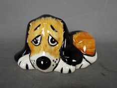 Lorna Bailey - a figurine of a dog entitled Dozy,