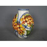 Moorcroft - a ceramic Hydrangea vase issued as a trail colourway,