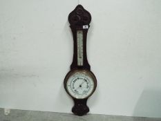 Carved Banjo Barometer. Made in England.