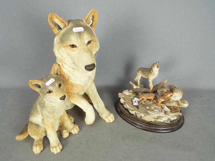 Country Artists - A large figural group depicting a wolf and cub entitled Safe Haven,