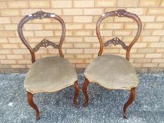 A pair of Victorian balloon back chairs Lot descriptions reflect the cataloguer's opinion only