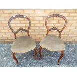 A pair of Victorian balloon back chairs Lot descriptions reflect the cataloguer's opinion only