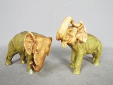 Two Royal Dux elephant figurines, unmarked, largest approximately 13 cm (h).